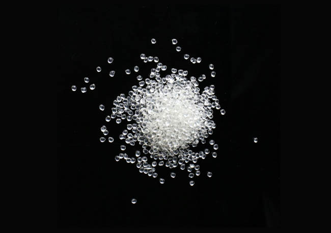 What is the difference between drop-on vs. premix glass beads for road markings?